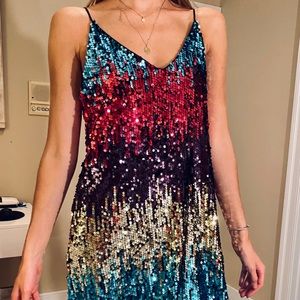 Fun, disco-esque mini dress with tons of sparkle